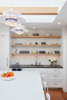 The open shelves over the sink are clear finished white oak. Photo 5 of A Danish Inspired Kitchen modern home