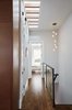 A narrow material palette keeps these large rooms from feeling too busy. Photo 3 of A Kitchen for the Boys modern home