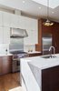 Light from a single south facing window adds warmth all day long. Photo 7 of A Kitchen for the Boys modern home