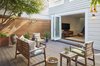 Large folding doors open up a new Garden room to the rear yard deck. Photo 2 of A Kitchen for the Boys modern home