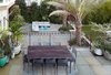 A Dining Terrace made a much better use of the Garage roof. It looks down over the Gathering Terrace. Photo 6 of Pacific Heights Historic Renovation modern home