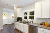 This backsplash is one of my favorites! A honeycomb pattern with a subtle and unique design on each one. Photo 8 of Elmwood modern home