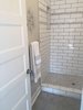 We used a beautiful patterned cement tile on this Master Bathroom Floor. Photo of Elmwood modern home