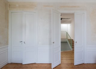 Original plaster and cornices have been repaired, including the existing flooring.
