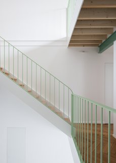 The color of the staircase brings a sense of personality to the space.