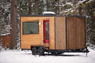 Based out of Portland, Tiny Heirloom is a family-run business. Their custom homes feature a signature rustic-modern style and are built with wood siding, large windows, and modern appliances. The Vantage model shown here is customizable and starts at $44,995. <br>