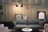 Modern home with Living Room, Chair, Wall Lighting, Coffee Tables, Sofa, and Rug Floor. Artwork fills the hotel's restaurant as well. Photo 11 of PURO Kraków Kazimierz