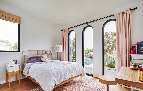 Best 4 Modern Bedroom Dresser Design Photos And Ideas Dwell The Master Bedroom Faces Street Three Dramatic Arched Windows At Front Of