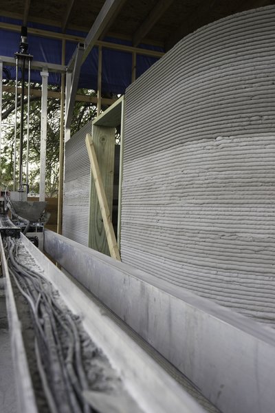 ICON prints walls layer by layer using a new type of mortar developed specifically for the purpose. 
