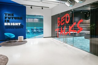 The communal area provides classrooms, workspaces, and other areas for studying and working.