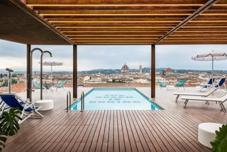 The hotel also features a partially covered pool on one of its upper floors.