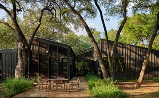 The asymmetrical, angular forms of the roofs create a dramatic interior filled with light from clerestory windows and high ceilings.