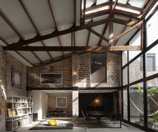 The bedrooms occupy the rear of the building, where it grows taller to once accommodate the theater’s rigging system.