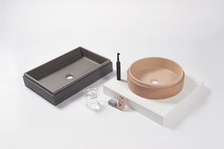 Available in ten different shades, the sink basins from Nood Co's concrete sinks are come as a vanity set or in several different shapes, including "pill"-shaped, trough, circular bowl, and a rectilinear box.