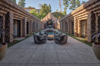 The home's courtyard originally featured a green lawn where guests could watch films and entertainers on a stage.