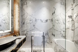 Materials like marble match the high quality of the original building—but they are employed in modern ways with contemporary details.