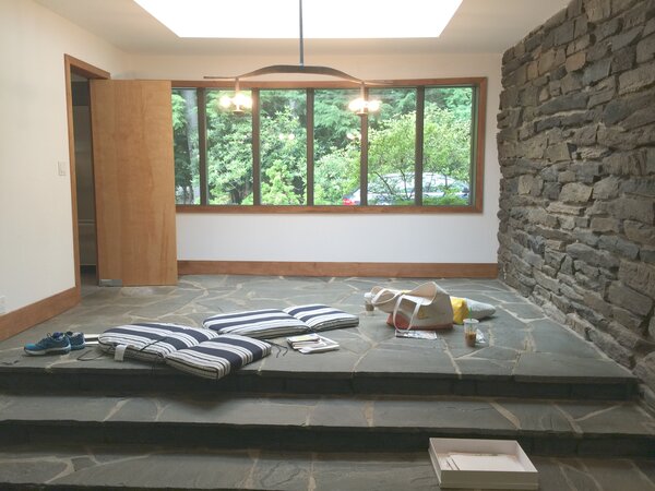 The fieldstone walls, original to the home, received a sandblasting to clean them. Repointing sealed the joints between the stone units and gave the wall an overall refresh.