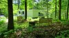 Outdoor campfire area. Most of the trees around the home are about 100 years old. Photo 3 of Phelps Residence modern home