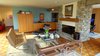 Mantel is rough sawn cherry from a nearby sawmill. Photo 11 of Phelps Residence modern home