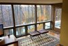 View of lake from Master Bedroom. Door to lakeside deck. Photo 15 of Phelps Residence modern home