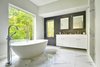 Master bathroom Photo of Oyster Shores modern home