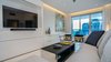 Custom Designed (by Boudreaux Design Studio) Entertainment Unit w/ remote controlled murphy bed Photo 3 of Roney Palace Modern Remodel modern home