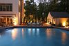Directly behind the custom gunite pool is a built-in gunite spa to match. Three sheer descent water features spill into the spa to create an aesthetic touch, as well as a therapeutic element for sore shoulders. Photo 9 of The Kalimtzis Residence modern home