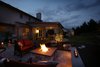 By replacing the overgrown plantings and failing deck structure with an open concept design we’ve successfully expanded the outdoor living space and set the mood for an ideal campfire and s’mores. Photo of The Stitt Residence modern home
