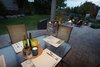 The soft LED lighting cast against the stone walls creates shadows making it a more dynamic evening space. Photo 2 of The Stitt Residence modern home