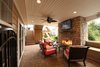This cozy patio has hidden storage underneath the switchback staircase and an open format so the client can keep an eye on the kids while they play. Photo 2 of The Nowak Residence modern home