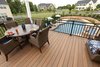 Under the custom pergola is an area for dining and relaxing while looking over the pool and spa area below. Photo 7 of The Nowak Residence modern home