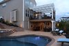 Every area of the home has instant access to the entertainment hub of the backyard. Photo 8 of The Nowak Residence modern home
