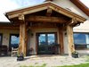 Modern home with Outdoor, Front Yard, Grass, Flowers, Trees, Concrete Patio, Porch, Deck, Large Patio, Porch, Deck, Wood Patio, Porch, Deck, Shrubs, Metal Patio, Porch, Deck, Metal Fences, Wall, Hanging Lighting, and Landscape Lighting. Front with views. Sunrise to Sunset! Photo 2 of Modern Romantic Western Home For Sale