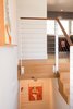 White Oak Flooring + Custom Railing Photo 17 of Edgewood modern home