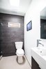 Guest Bathroom: Frameless Glass Entries + Floor to Ceiling Tile Work Photo 8 of Edgewood modern home