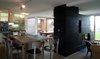 Kitchen with the dining area and the fireplace Photo 12 of Wood House modern home