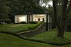 Modern home with Exterior, House, Flat RoofLine, and Glass Siding Material. Architect: Augustus Mino + Robert Fitzpatrick, Location: Chappaqua, New York Photo 6 of Glass House