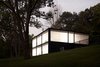 Exterior at dusk. Photo 2 of Glass House modern home