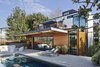 The outdoor furniture is a combination of Room and Board Oasis Collection and Knoll 1966 Line using Sunbrella Fabrics. A rare planter by Artist Willy Guhl and a Michael Smolcich planter adorn the pool deck. Photo 5 of Adelaide House modern home