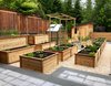 Modern home with Outdoor, Vegetables, Back Yard, Horizontal Fences, Wall, Raised Planters, Wood Fences, Wall, and Stone Patio, Porch, Deck. Back yard, overlooking the raised planters vegetable garden II Photo 8 of Port Moody Makeover