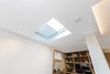 Modern home with Living Room and Ceiling Lighting. Motorised skylight in the living room Photo 6 of Regent's Park Townhouse