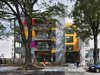 Building entrance along Rhode Island Avenue NW Photo of In Living Color modern home
