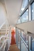 Interior stairs that face the central court. Photo 3 of A Clear View modern home