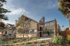 A front patio space encourages neighborly interactions and a peaceful space to enjoy the year-round perfect weather. Photo of The Modern Mission modern home