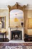 Original 19th century mirrors are found throughout the home Photo 9 of An Artful Townhouse in the West Village modern home