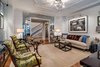 Modern home with Living Room, Sofa, Ceiling Lighting, and Medium Hardwood Floor. Lavish parlor Photo 4 of Artistry & Modernity: Maisonette West