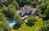 Modern home with Exterior, House Building Type, Shingles Roof Material, Wood Siding Material, and Stone Siding Material. An aerial view of 25 Garden Road. Simply sublime. Photo of Regal in Westchester