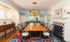 Modern home with Dining Room, Table, Ceiling Lighting, Chair, Wall Lighting, and Wood Burning Fireplace. The dining room, with fireplace, can host at least ten people for a meal Photo 5 of Regal in Westchester