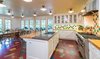 Modern home with Kitchen, Refrigerator, Ceramic Tile Backsplashe, Drop In Sink, Wall Oven, White Cabinet, and Range. The large eat-in kitchen is perfect for entertaining Photo 6 of Regal in Westchester