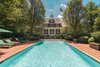 Modern home with Outdoor, Trees, Walkways, Gardens, Swimming Pools, Tubs, Shower, Large Patio, Porch, Deck, and Back Yard. A view from the pool Photo 10 of Regal in Westchester